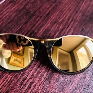 Revo Sunglasses with Gold Lenses